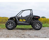 Side profile of an Arctic Cat Wildcat Trail with the SuperATV 2-3 inch lift kit and oversized mud tires