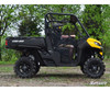 Side profile of a yellow and black Can-Am Defender with the SuperATV 3-inch lift kit and mud tires installed