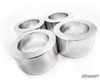 Four polished aluminum lift spacers included in the SuperATV John Deere Gator XUV 835 2 inch lift kit