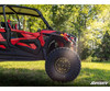 Low side view of the lifted red Polaris RZR XP Turbo S showing front tire clearance from the SuperATV 3-inch lift kit