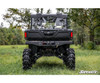 Rear view of the yellow and black Can-Am Defender showing the ground clearance from the SuperATV 6-inch lift