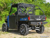 SuperATV rear roll cage support installed on a blue Polaris Ranger with mud tires, rear three-quarter view in a field