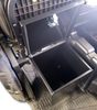 Hi-Standard security box with the lid open showing the empty steel interior under the seat of a Polaris Ranger