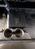 Top-down view of the closed Hi-Standard center console box and lock in a Polaris Ranger with cup holders in front