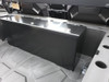 Angled view of the closed Hi-Standard security box in the Polaris General 1000 bed showing the lid latches