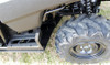 Low side view of the Honda Pioneer 700-4 rear wheel with the Trail Armor skid plate under the rocker panel