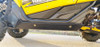 Trail Armor integrated rock slider along the rocker panel of a yellow Yamaha YXZ 1000R, low side view