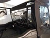 Side X Side soft doors and rear window on a Honda Pioneer 1000-5, rear three-quarter view