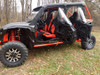 Side X Side upper doors kit on a red and black Honda Talon 4 with all four doors swung open, side view