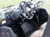 Sure Grip hand control lever mounted at the steering column of a camo Yamaha Viking, view from the driver door
