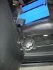 Inside view of the Trail Armor Slimline debris shield next to the Polaris RZR seat, showing the mounting knob