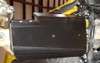 Close-up of the Trail Armor black guard bolted under the Yamaha YXZ 1000R trailing arm near the rear hub