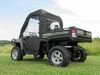 Rear three-quarter view of the 3 Star full cab enclosure on the green John Deere Gator showing the rear window and bed