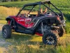 Spike door inserts for Honda Talon 2- and 4-seat: lower door inserts on a red Honda Talon, side view