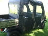 3 Star full cab enclosure installed on a camo Kawasaki Mule 3000/3010 Trans, rear three-quarter view