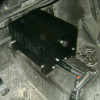 Universal Parts heater box installed on the floor of a Kawasaki Mule cab with hoses and wiring routed to it