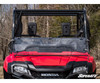 SuperATV scratch resistant flip down windshield on a red Honda Pioneer 700, front view in the closed position