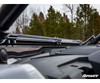 Close-up of the SuperATV flip down windshield hinge and latch at the roof line of a Polaris RZR PRO XP