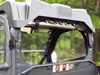 Seizmik back panel closed on a John Deere Gator XUV showing the clear rear window and roof, rear view