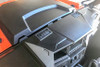 Passenger side view of the orange Polaris General 1000 dash with a Universal Parts Inferno defrost vent installed