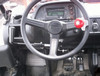 Sure Grip hand controls for the Honda Big Red, lever with red knob mounted beside the steering wheel inside the cab