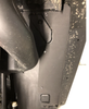 Trail Armor fender liner installed in the rear wheel well of a muddy Polaris RZR Pro XP, close-up