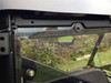 Close-up of the Extreme Metal Products rear window upper corner clamp and bolt on the cab frame, seen from outside