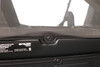 Lower mounting bolt of the Extreme Metal Products hard rear window seen from inside the cab above the bed panel