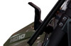 Close-up of the Seizmik Versa-Fold windshield side hinge bracket at the hood of a green Can-Am Defender