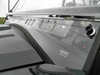 Close-up of the 3 Star two-piece windshield lower vent slots and rubber trim on the hood of an Arctic Cat Prowler