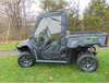 Side view of the gray Arctic Cat Prowler Pro with 3 Star soft doors and clear windows, angled slightly from the front
