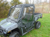 3 Star soft doors and rear window combo on a gray Arctic Cat Prowler Pro, front three-quarter view on grass