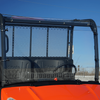 Seizmik Aero-Vent windshield installed on an orange Kubota RTV XG850 Sidekick, straight-on front view