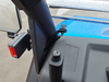 Close-up of the 3 Star windshield clamp bolted to the cage pillar of a blue CF Moto UForce 1000, inside view