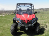 Front view of a red CFMoto ZForce with the 3 Star windshield installed, parked on a grassy hilltop