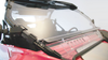 Close-up of the 3 Star windshield lower vent panel and hinge on the hood of a red CF Moto ZForce 950