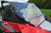 Side view of the 3 Star windshield on a red CF Moto ZForce 950 showing the ZForce 950 door graphic and seat