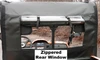 Close-up of the 3 Star zippered rear window panel seen from the cargo bed of a side-by-side, clear vinyl window rolled down