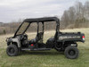 Full side view of a John Deere Gator XUV-4 crew under the 3 Star soft top, windshield at the front