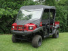 3 Star vinyl windshield, soft top and rear window on a red Kawasaki Mule 4010 Trans, front 3/4 view on grass