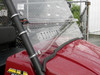 3 Star 2-piece scratch-resistant windshield on a red Kawasaki Mule, close-up of the vent and cage clamps