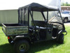 Rear three-quarter view of the 3 Star vinyl top on a camo four-seat side-by-side with the cargo bed visible