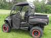 3 Star vinyl windshield, top and rear window installed on a black side-by-side with red-trim wheels, driver side view