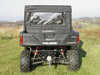 Small distant rear view of a Polaris Ranger 700 Crew with the 3 Star top and rear window installed