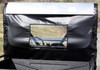 Greene Mountain black rear windjammer with clear window and silver roof panel on a Yamaha Rhino, rear view