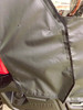Close-up of a Greene Mountain soft door panel with snap fasteners beside the Yamaha badge on a Viking VI