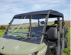 Close front three-quarter view of the 3 Star soft top edge and windshield on a green Can-Am Defender Max