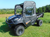 Front three-quarter view of a black Kubota RTV XG850 with the 3 Star soft doors, roof and rear window