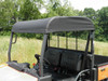 Close-up of the 3 Star black soft top over the cab of an orange Kubota RTV XG850, seen from the front above the hood