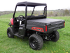 Rear three-quarter view of a red Polaris Ranger 570 MidSize wearing the 3 Star soft top